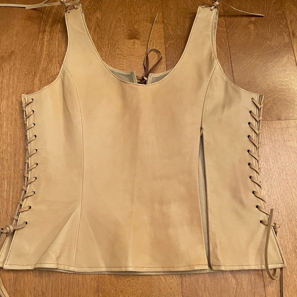 Harley Davidson leather tank top with tie details. It has been gently worn.
